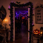 Mein Shop 6 schwarz-weißes Deko-Band als Girlande um einen Türrahmen mit Fledermaus-Motiven für Halloween-Dekoration